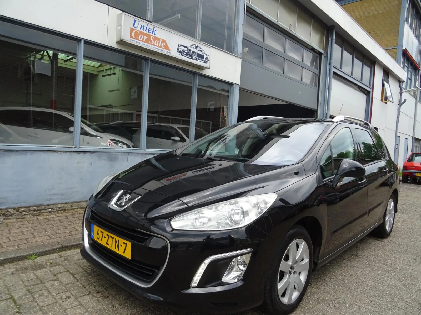 Peugeot 308 (2012) — foto 1