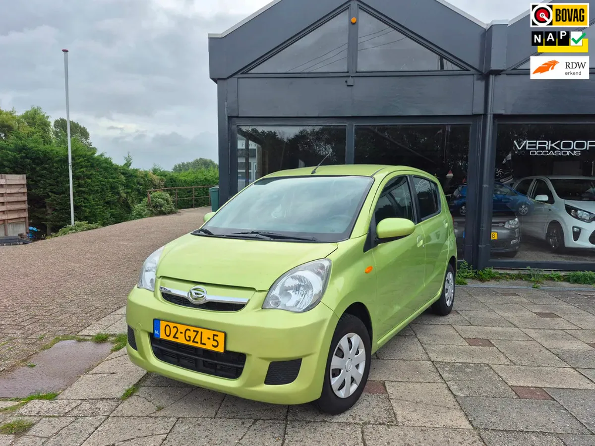 Daihatsu Cuore (2008) — foto 1