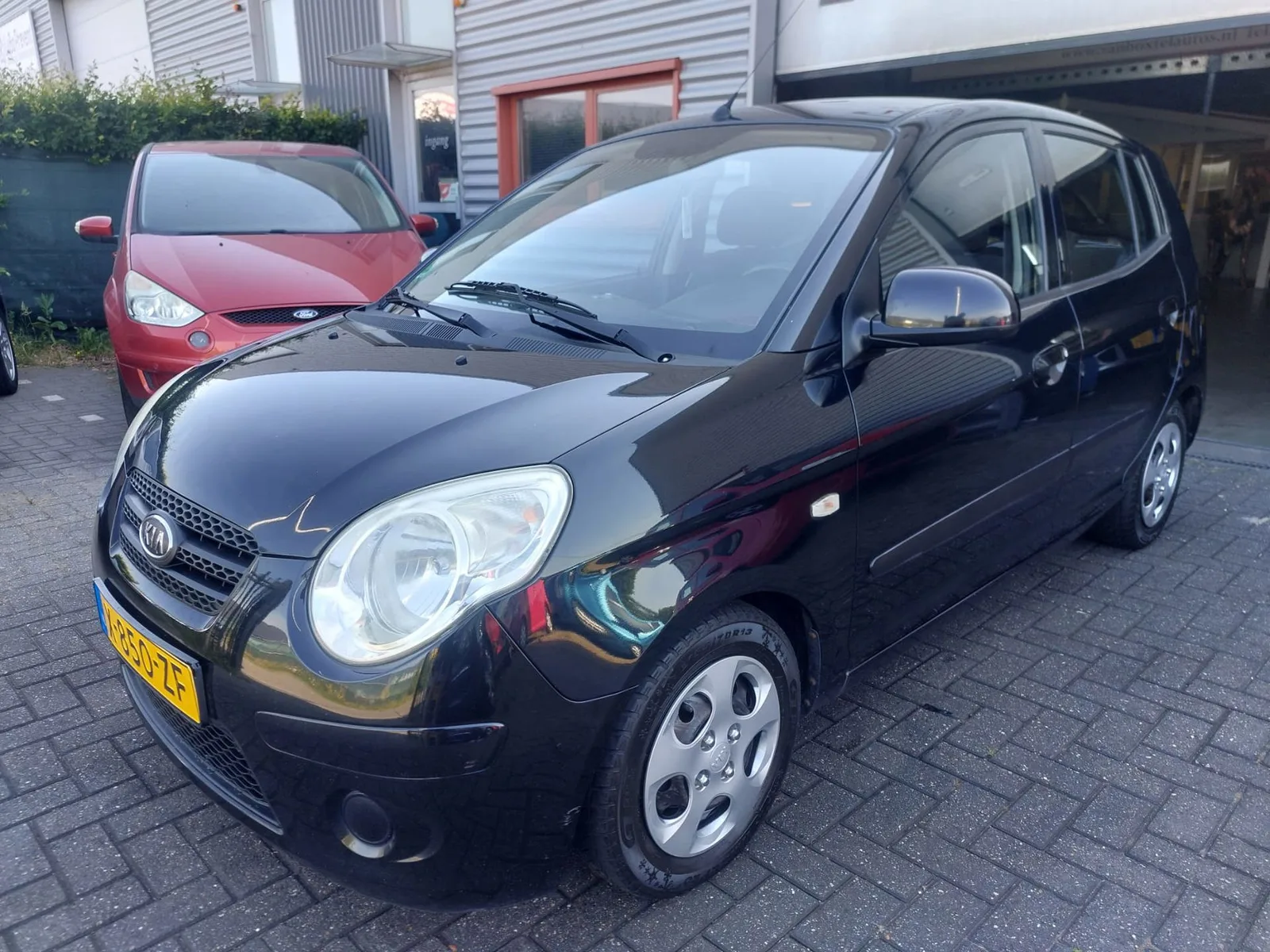 Kia Picanto (2010) — foto 1
