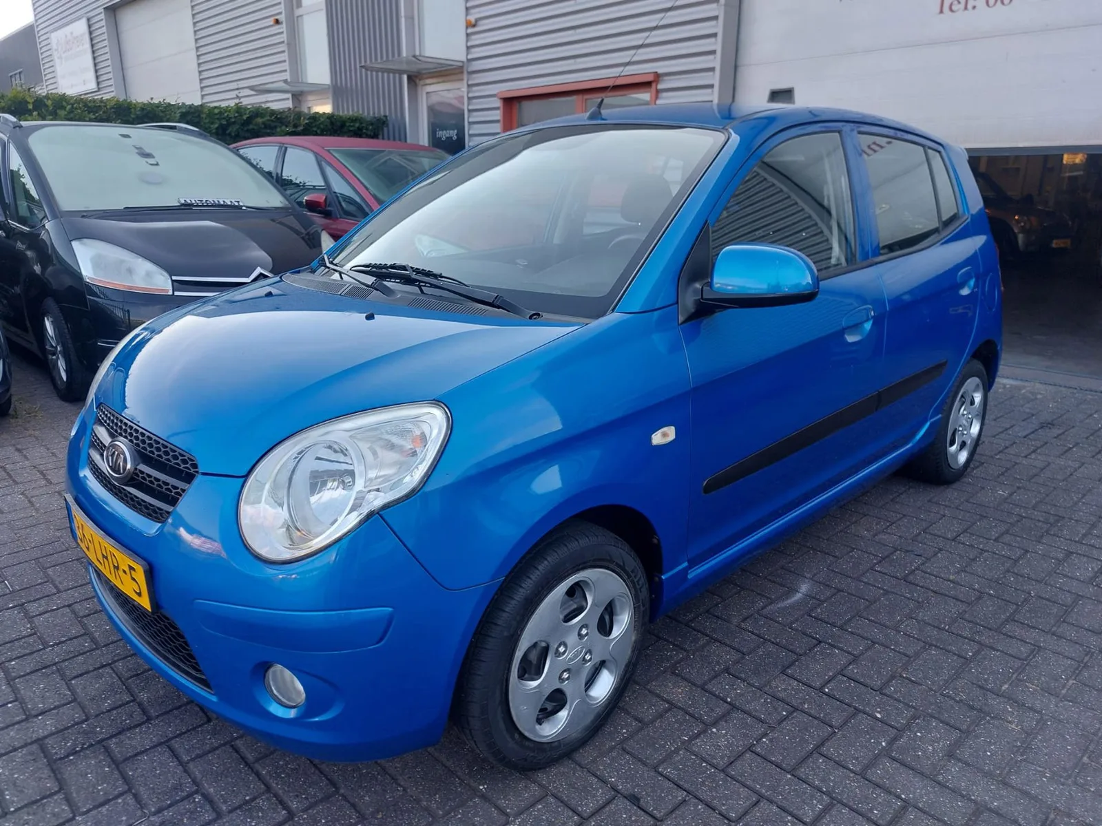 Kia Picanto (2010) — foto 1