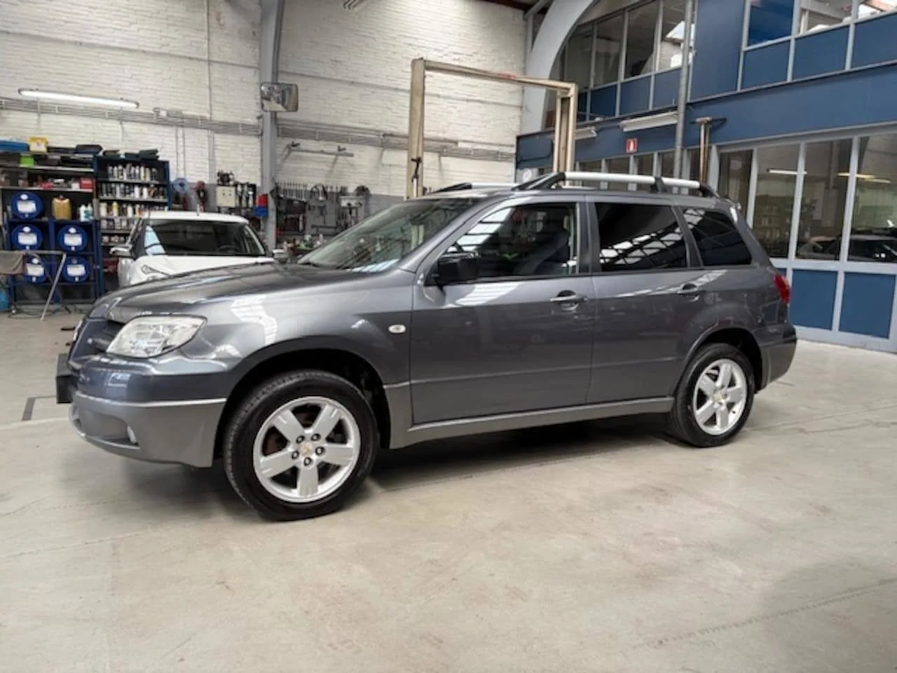 Mitsubishi Outlander (2009) — foto 1