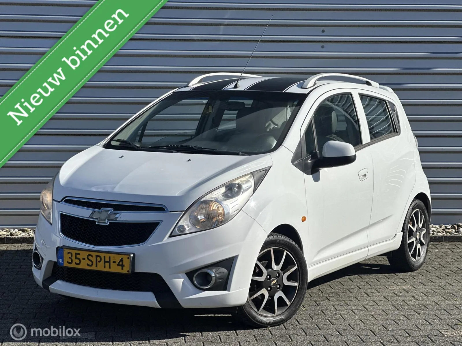 Chevrolet Spark (2011) — foto 1
