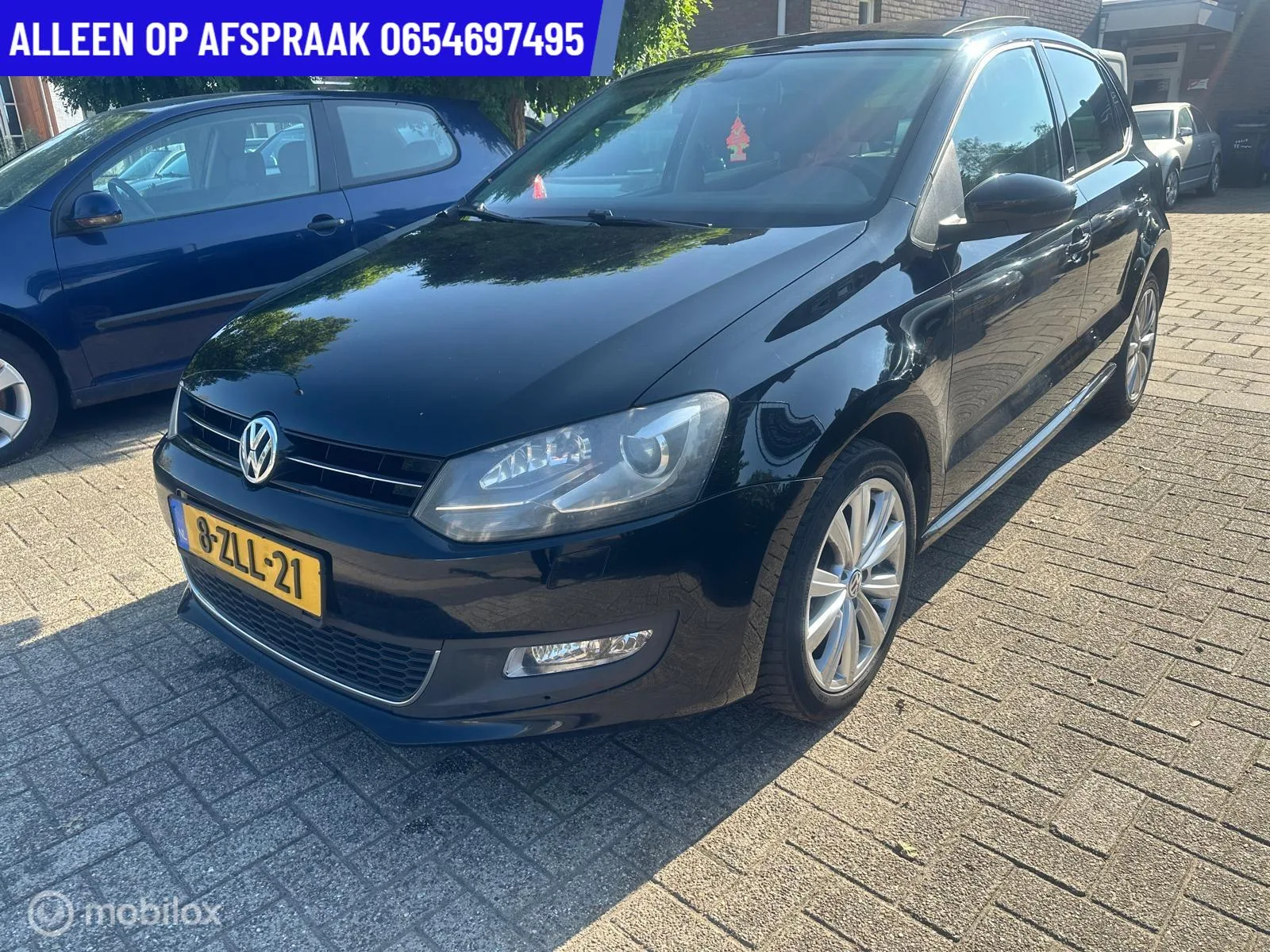 Volkswagen Polo (2011) — foto 1
