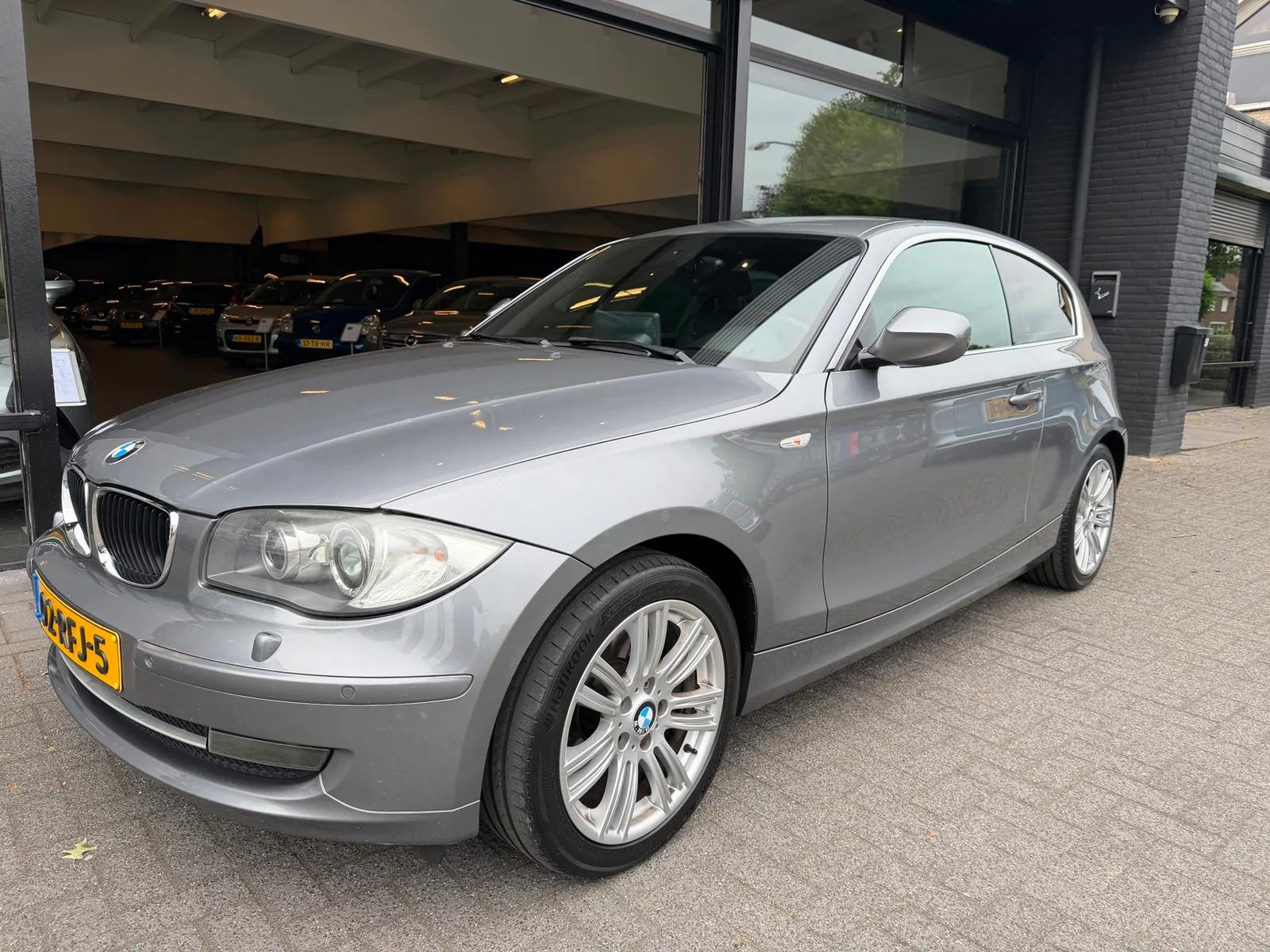 BMW 1-Serie (2011) — foto 1