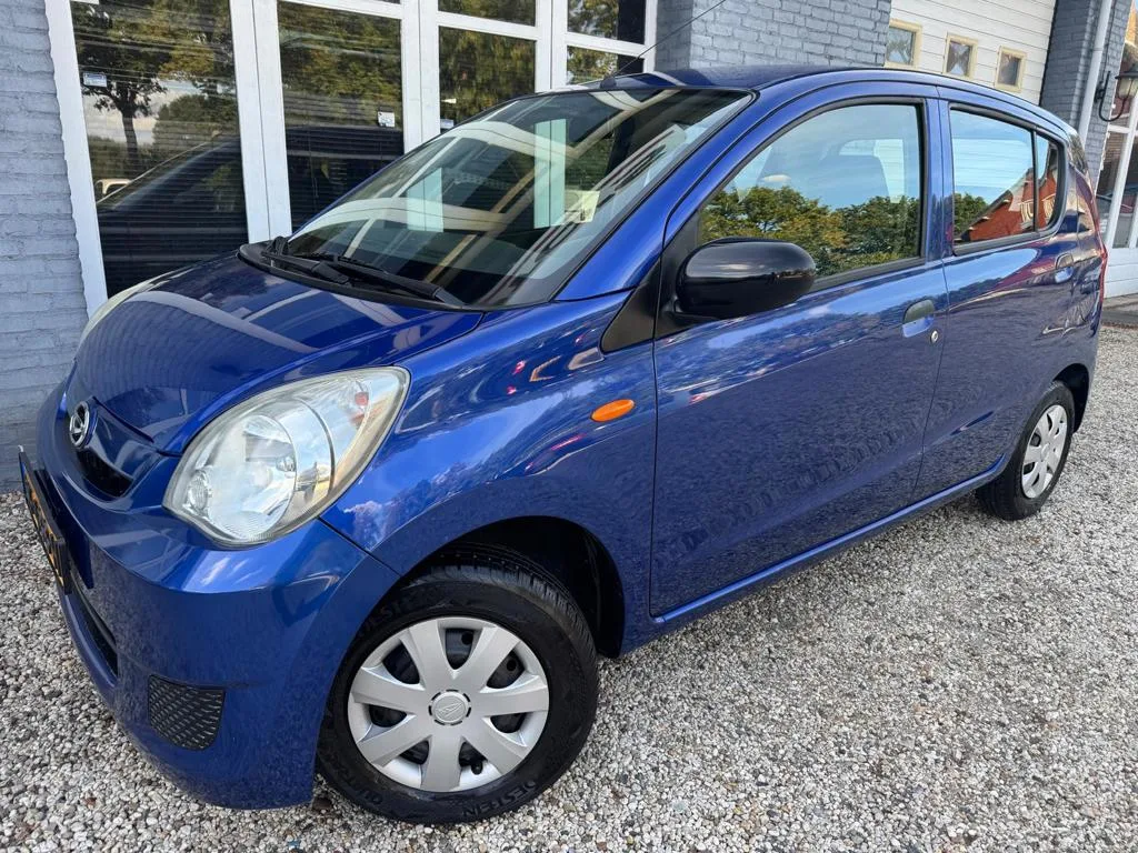 Daihatsu Cuore (2009) — foto 1