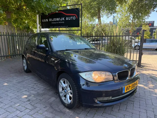 BMW 1-Serie (2009) — foto 1