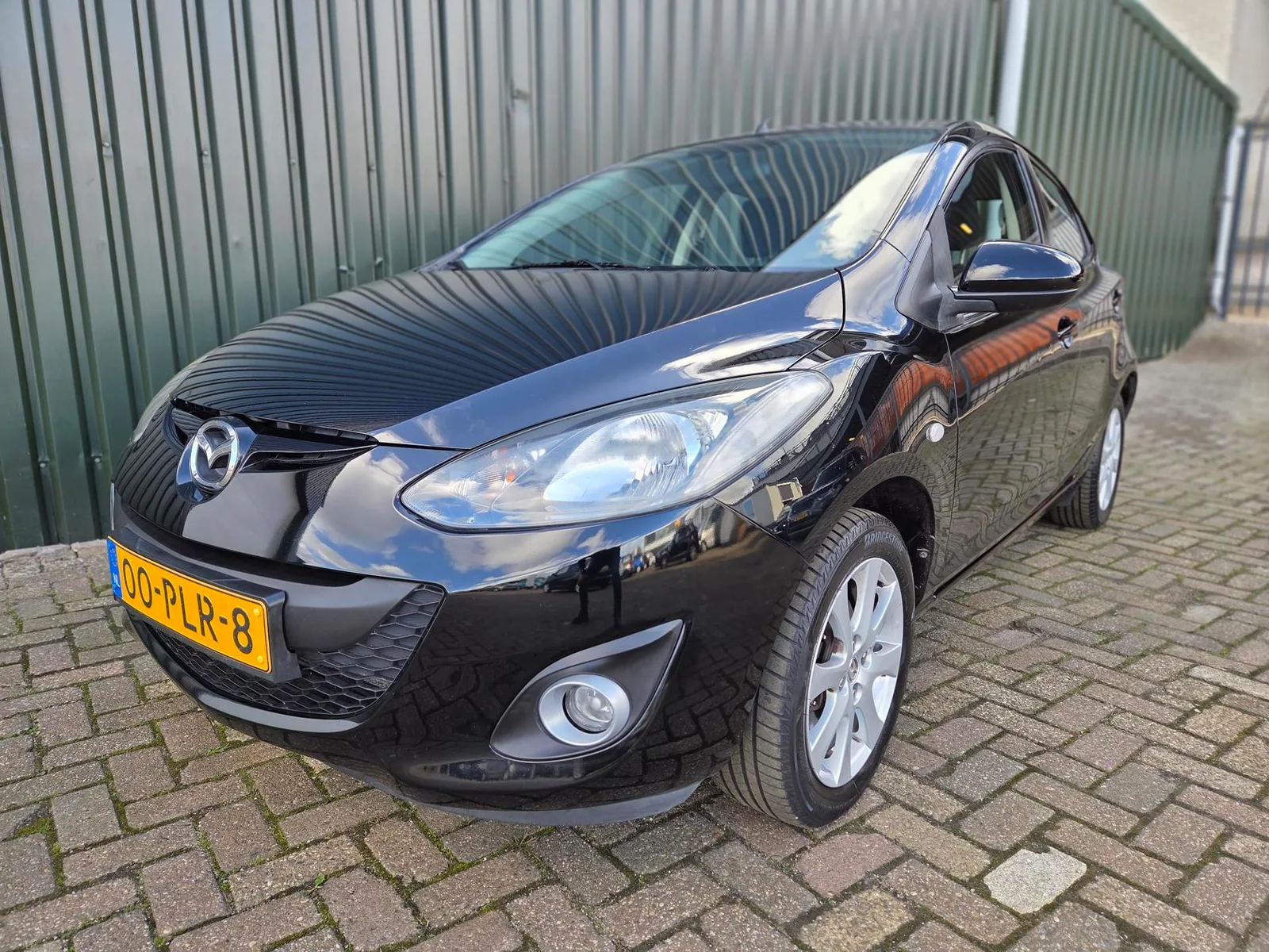 Mazda 2 (2011) — foto 1