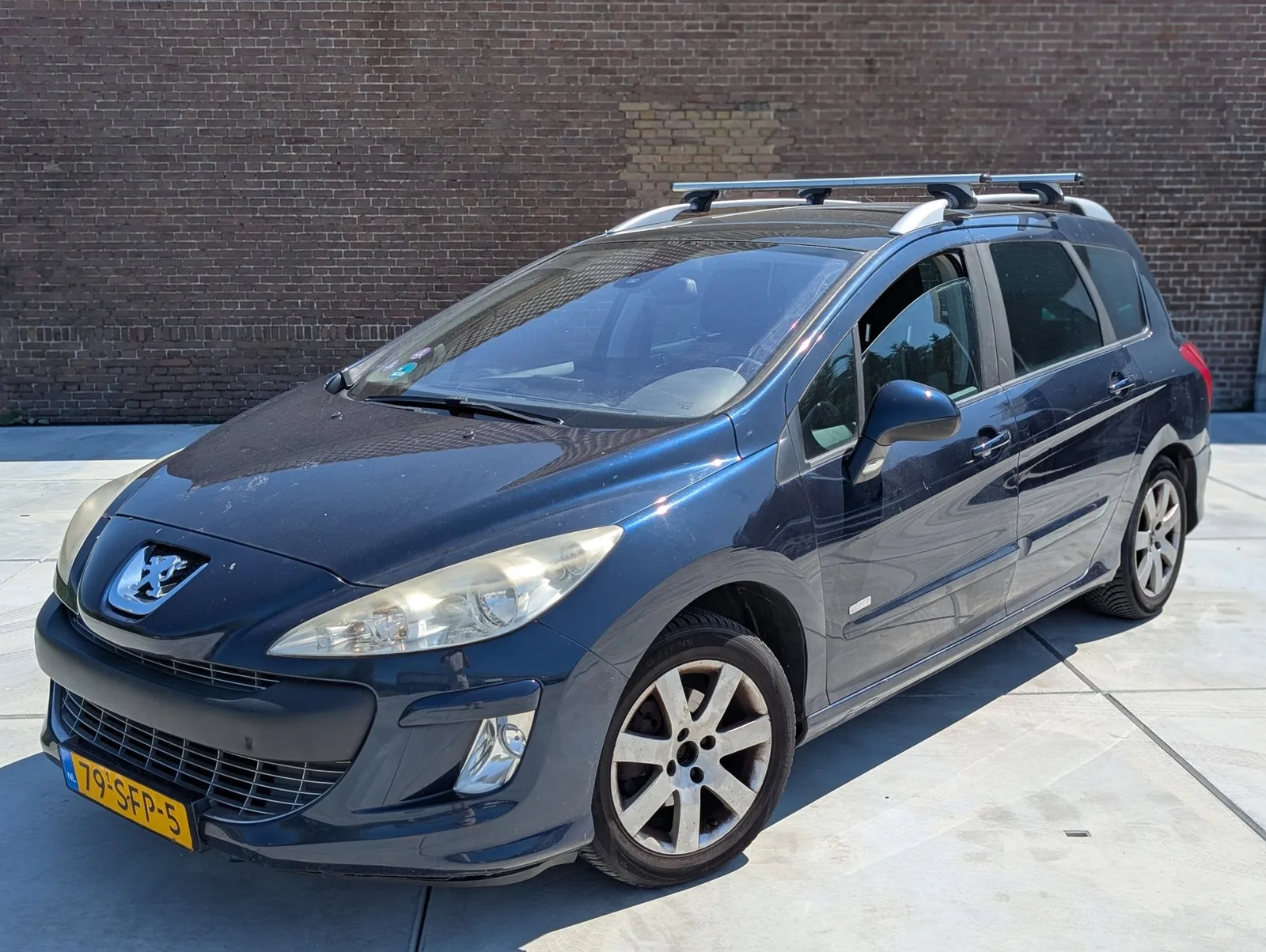 Peugeot 308 (2011) — foto 1