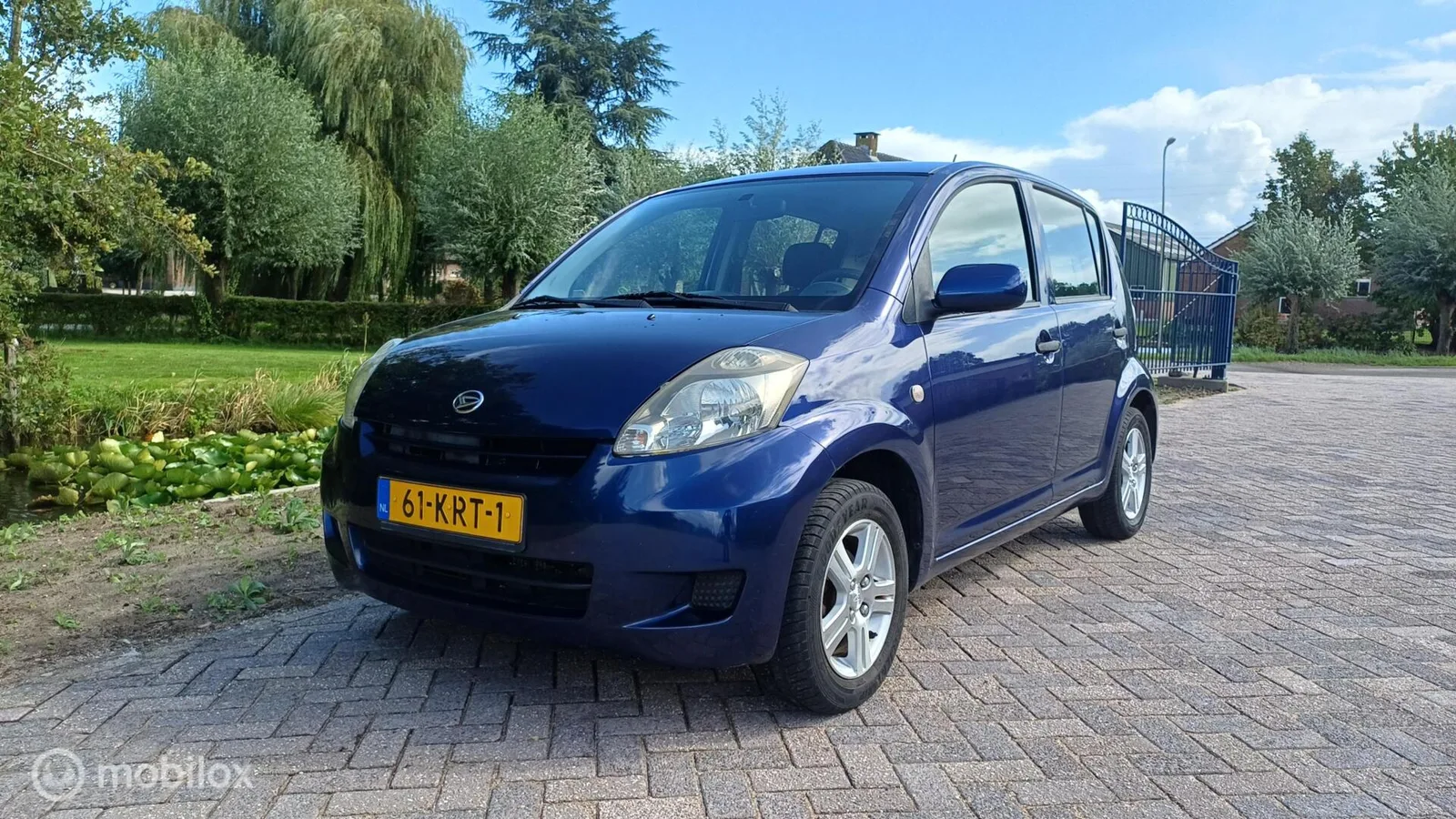 Daihatsu Sirion (2007) — foto 1