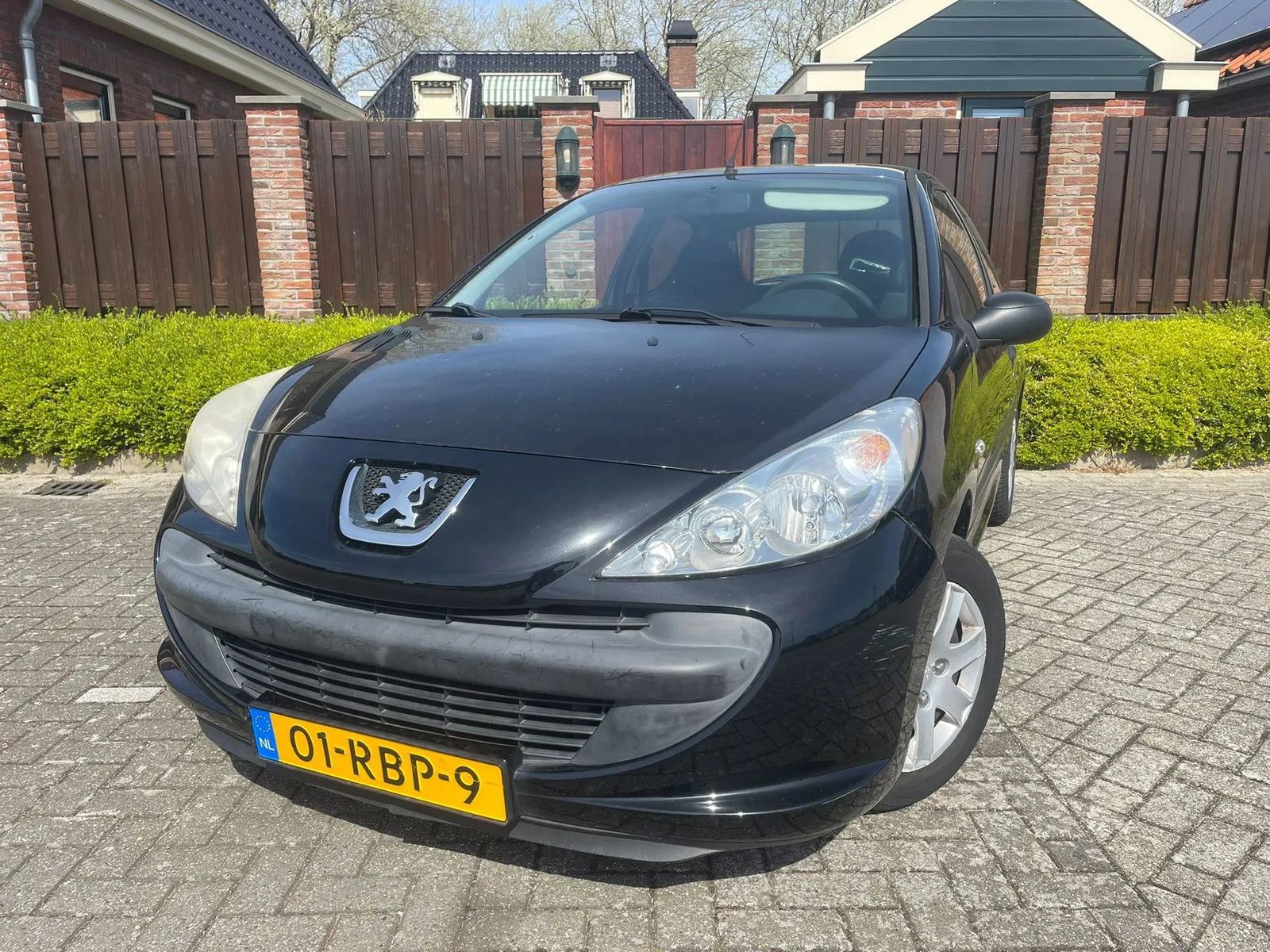 Peugeot 206 (2011) — foto 1
