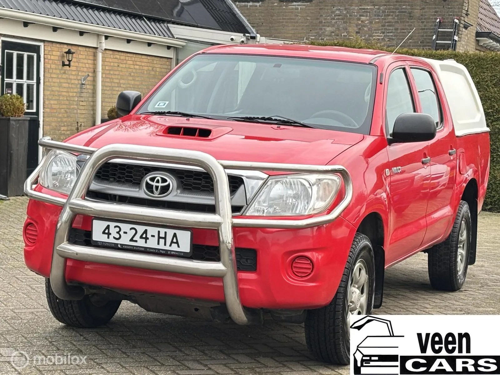 Toyota Hilux (2011) — foto 1