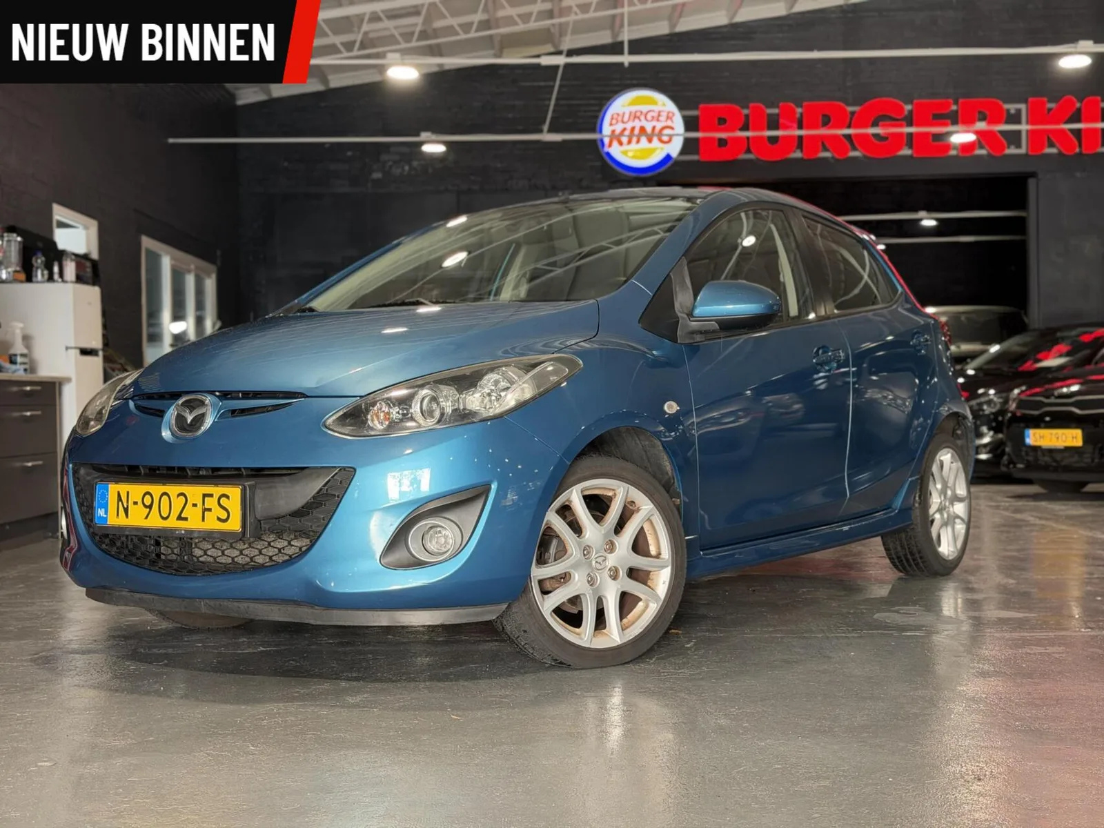 Mazda 2 (2012) — foto 1