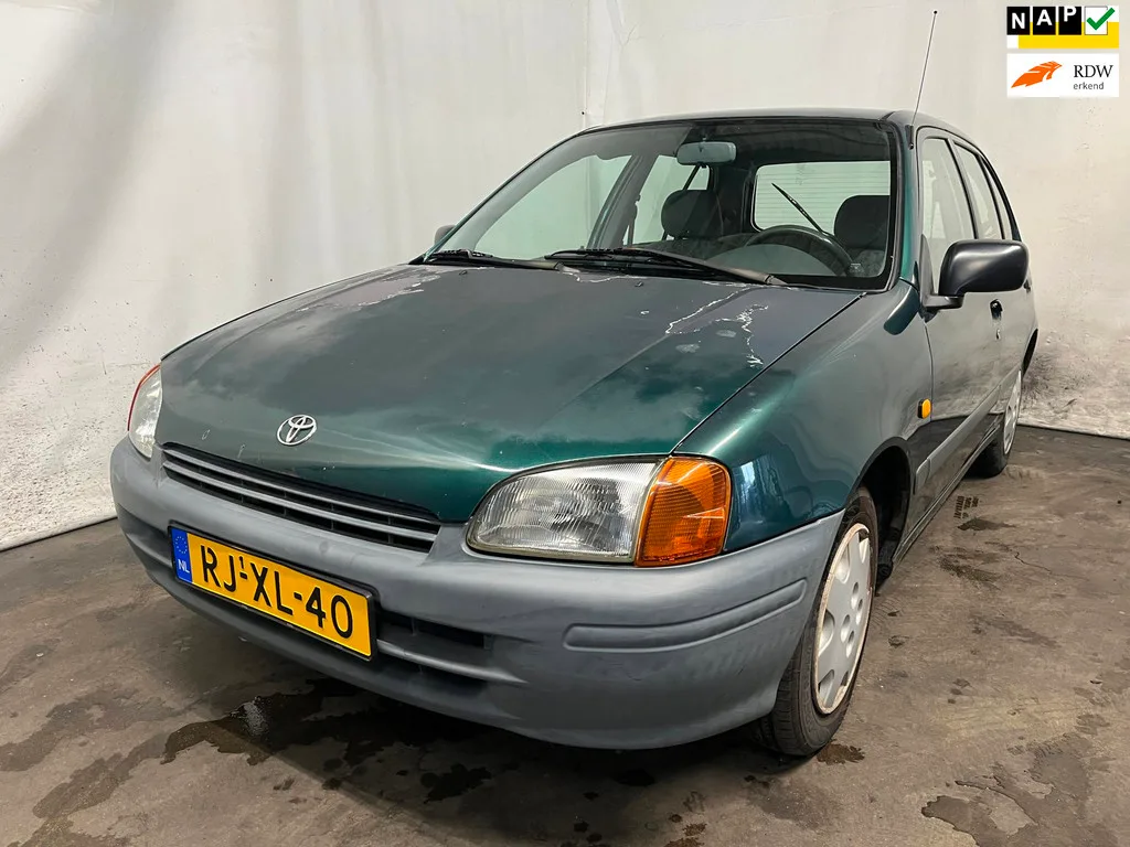 Toyota Starlet (1997) — foto 1