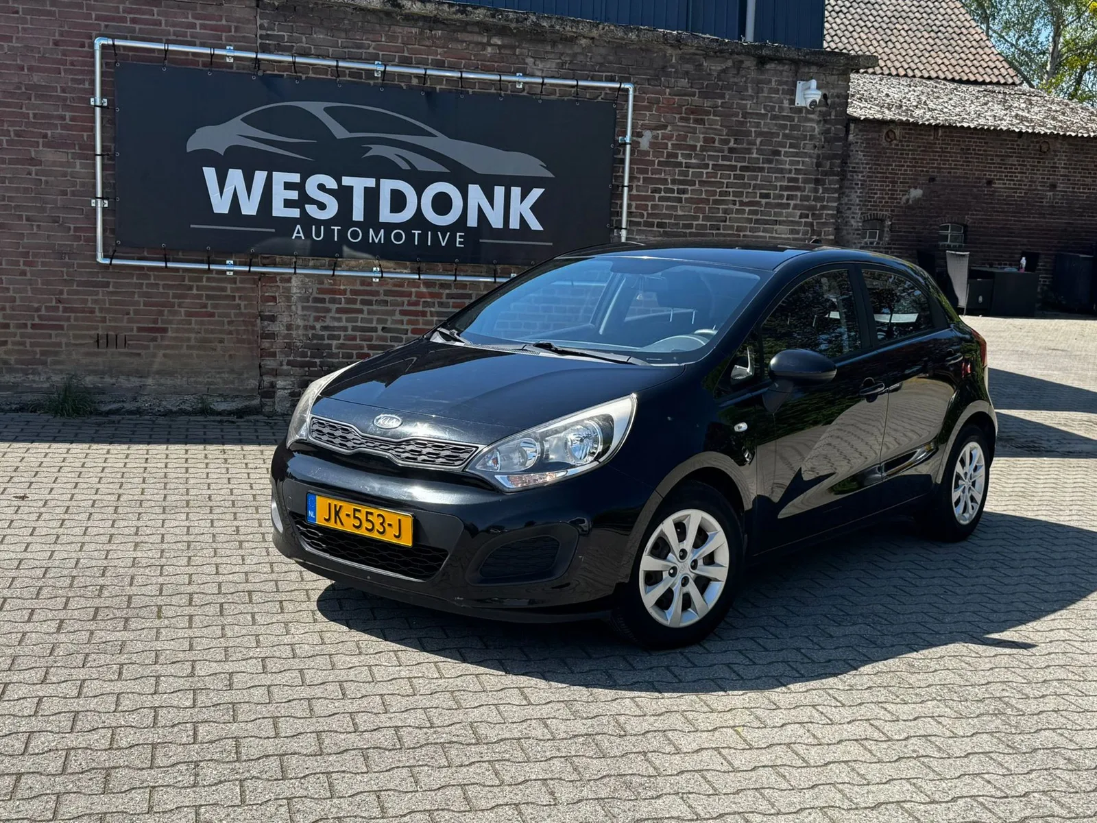 Kia Rio (2012) — foto 1