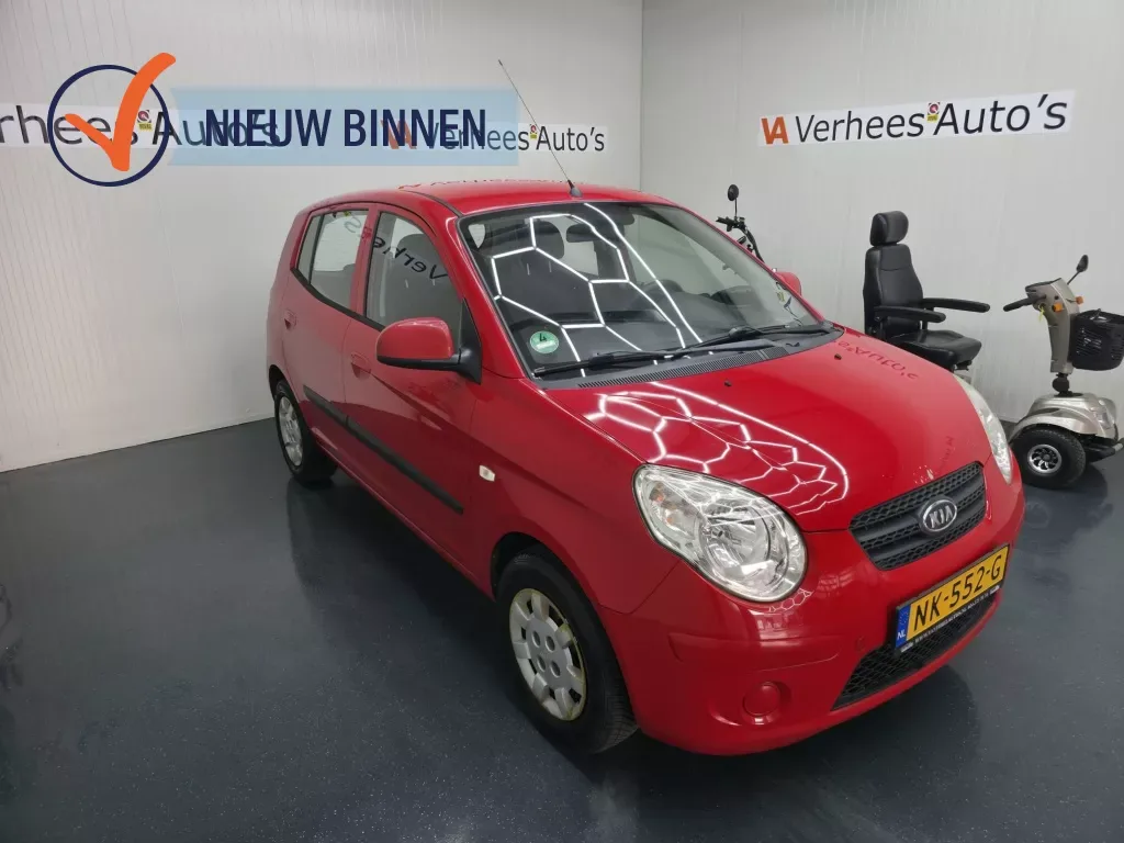 Kia Picanto (2009) — foto 1