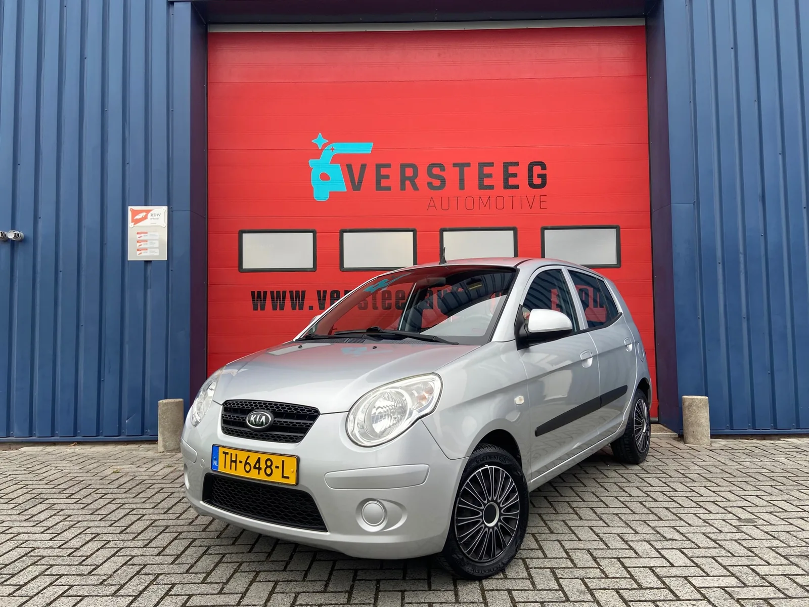 Kia Picanto (2009) — foto 1