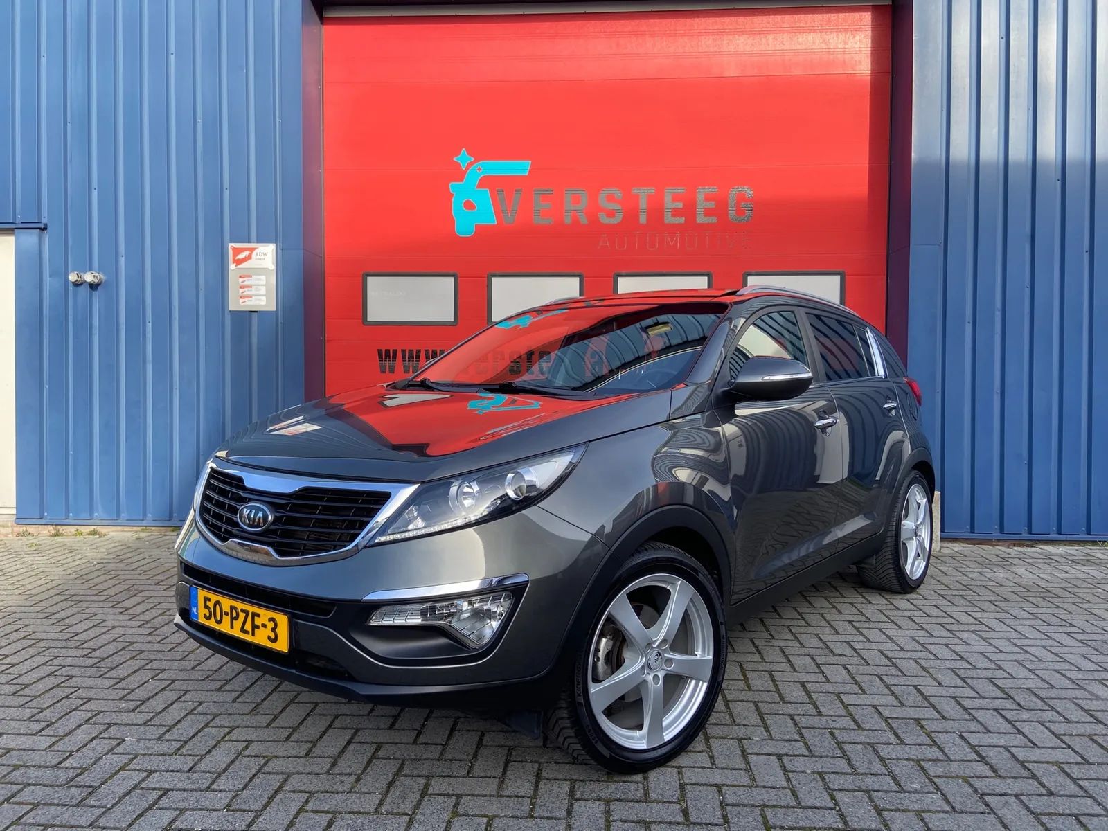 Kia Sportage (2011) — foto 1