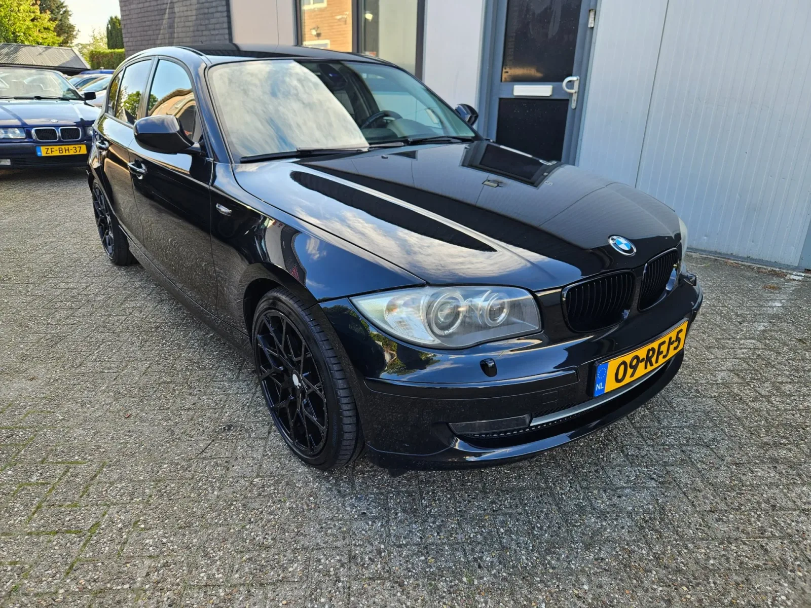 BMW 1-Serie (2011) — foto 1