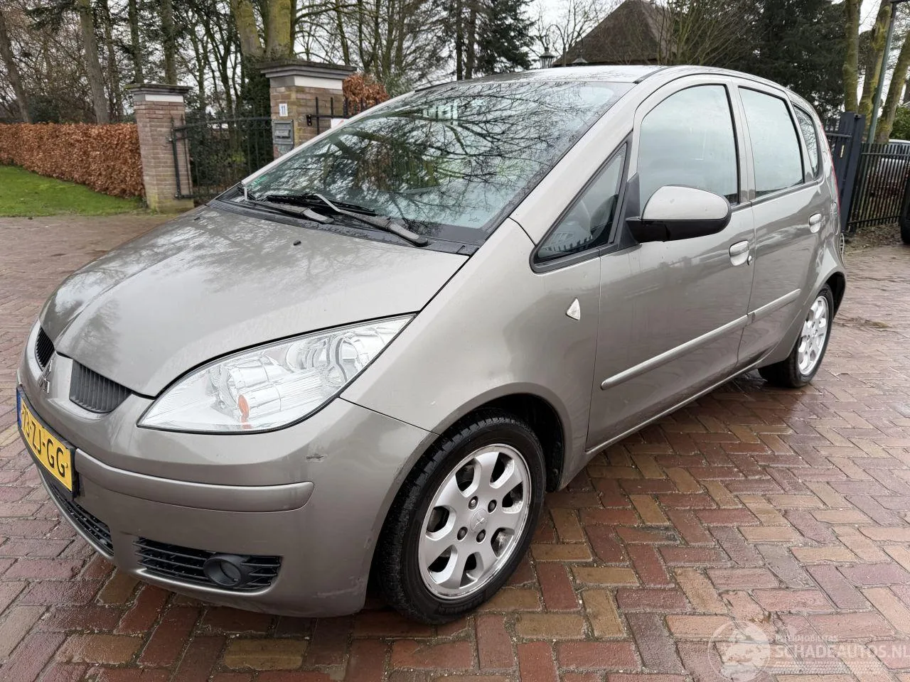 Mitsubishi Colt (2008) — foto 1