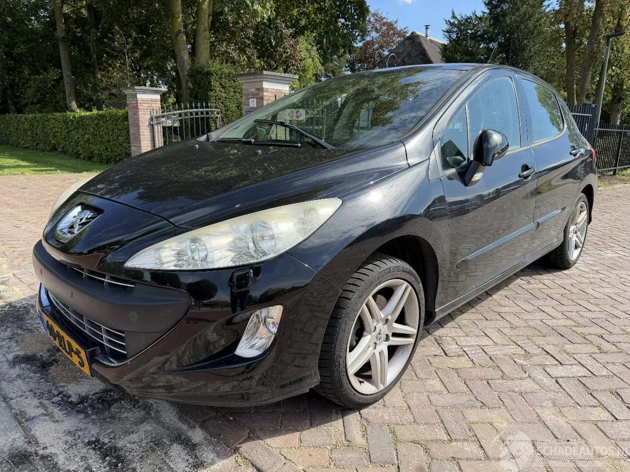 Peugeot 308 (2011) — foto 1