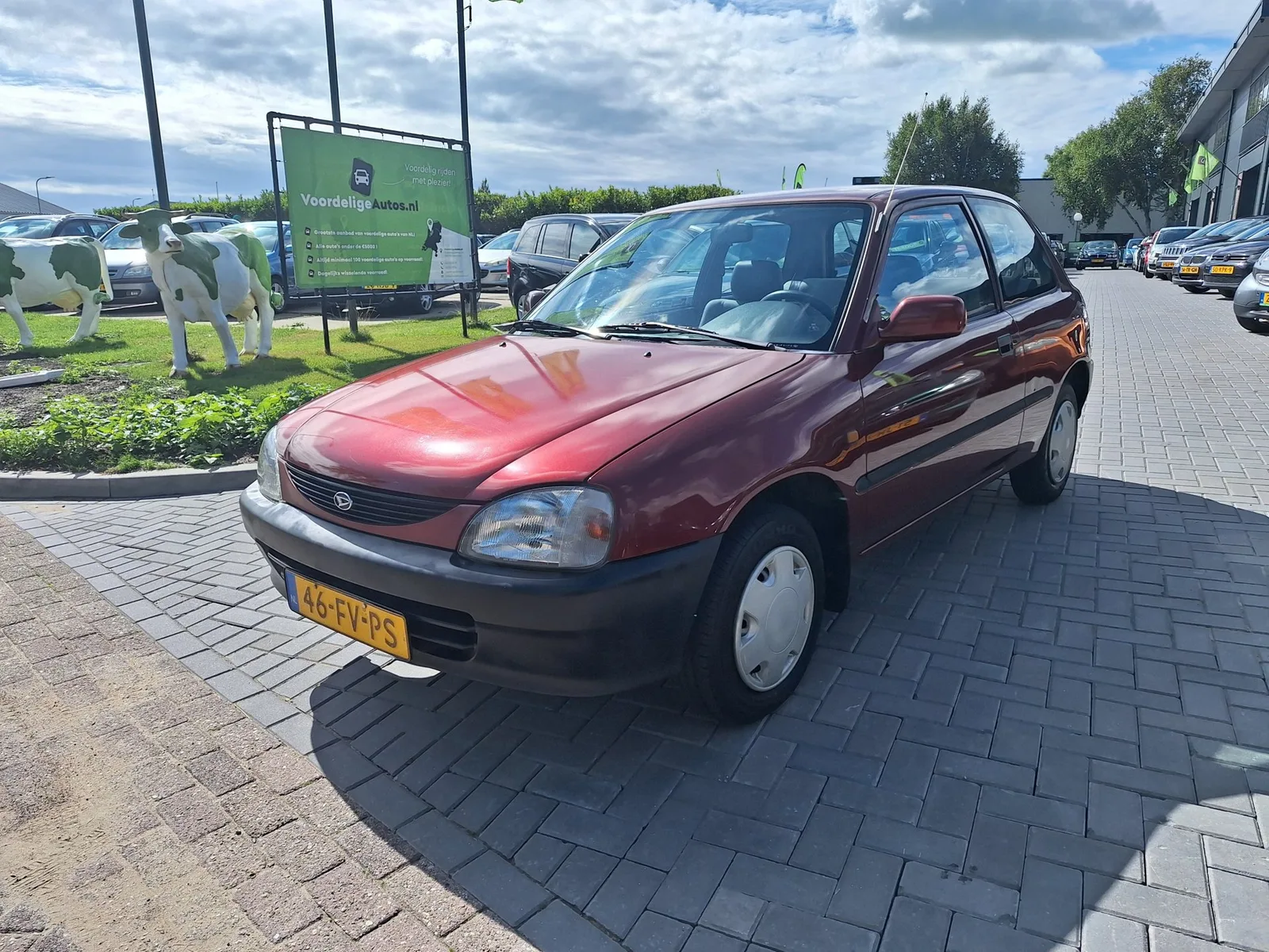 Daihatsu Charade (2000) — foto 1