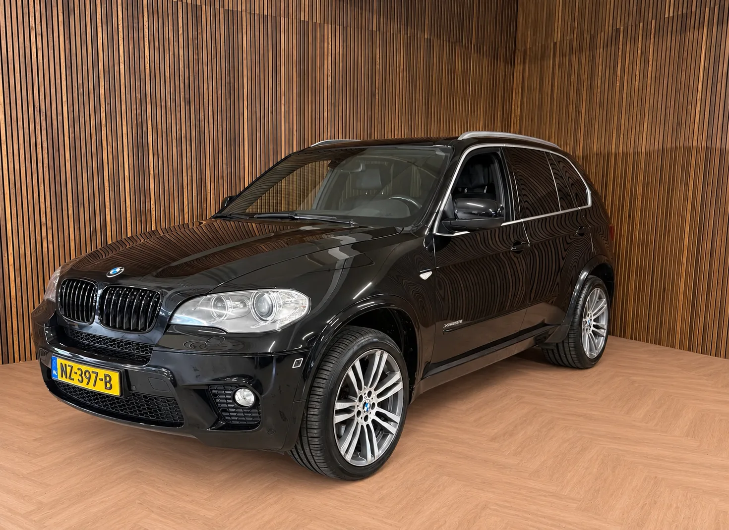 BMW X5 (2010) — foto 1