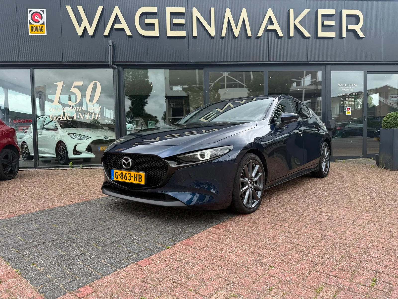 Mazda 3 (2019) — foto 1