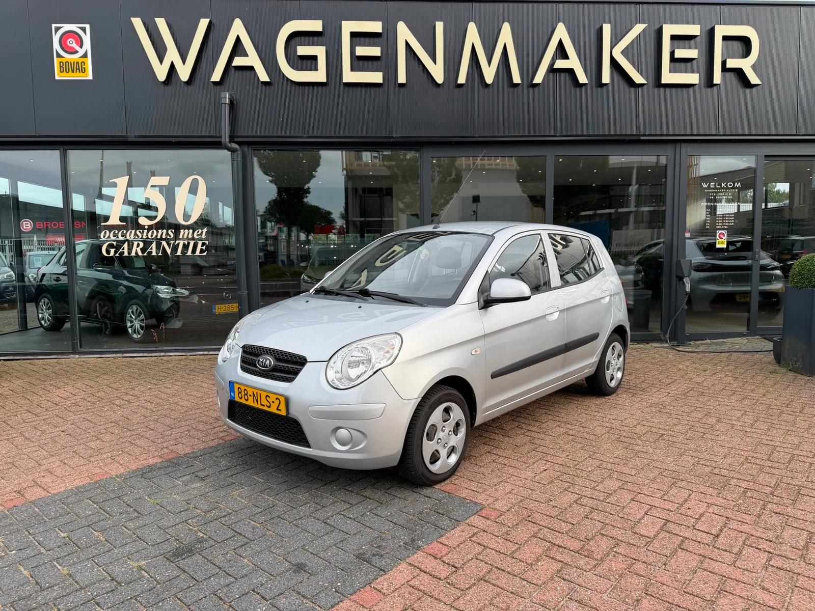 Kia Picanto (2011) — foto 1
