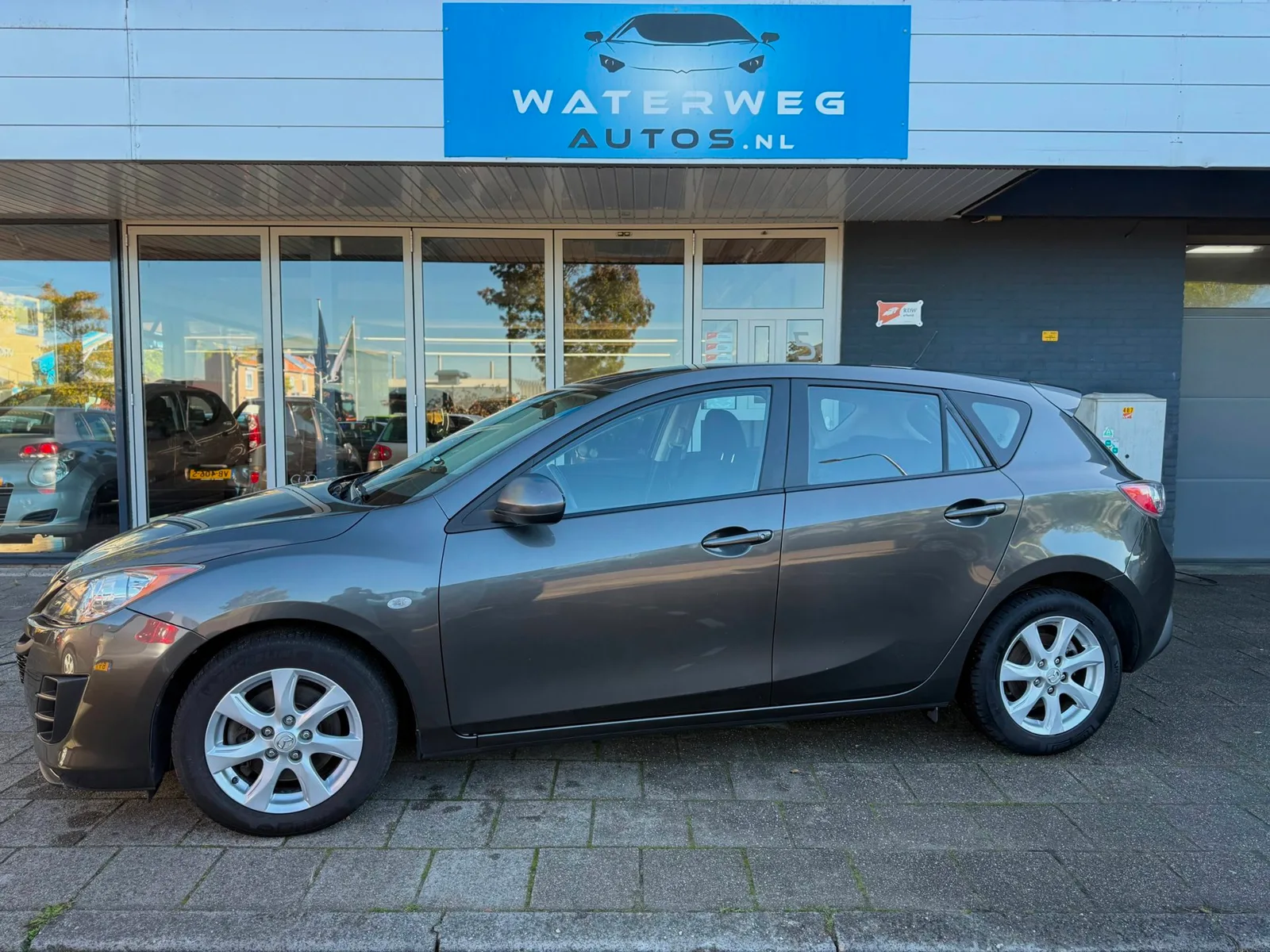 Mazda 3 (2010) — foto 1
