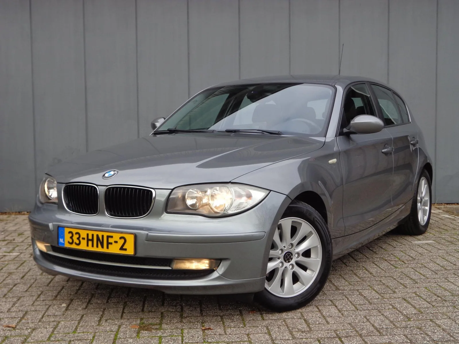 BMW 1-Serie (2009) — foto 1