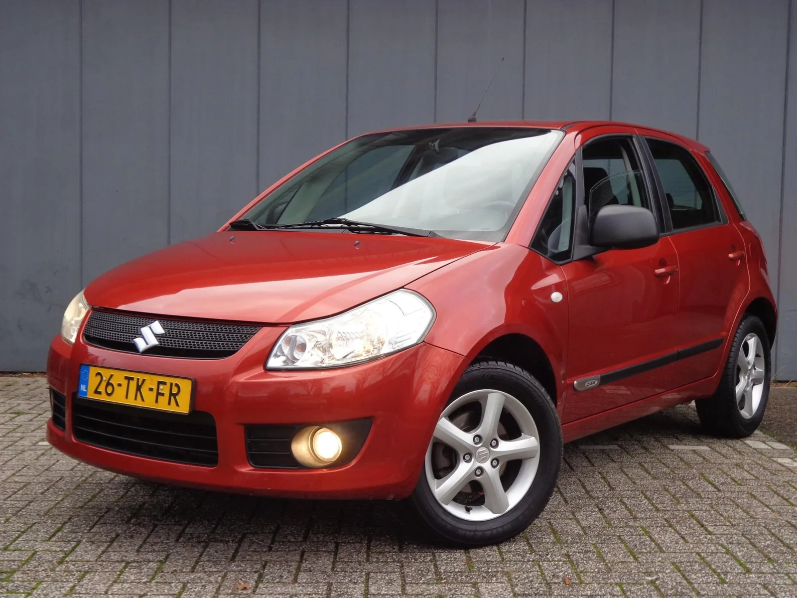 Suzuki SX4 (2006) — foto 1