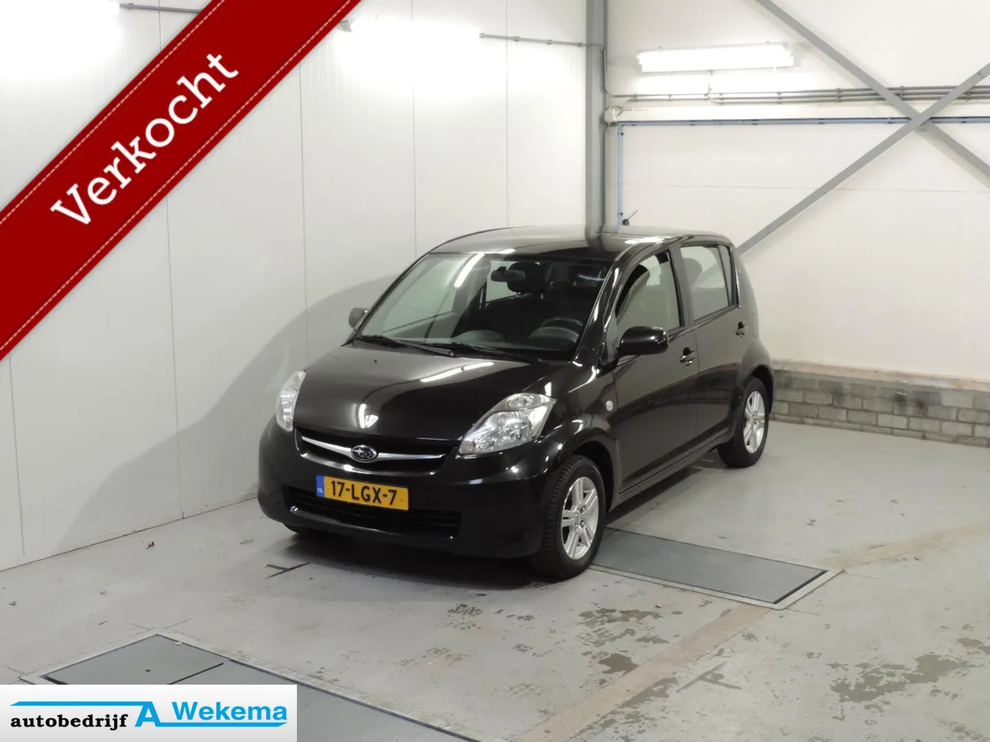 Subaru Justy (2010) — foto 1