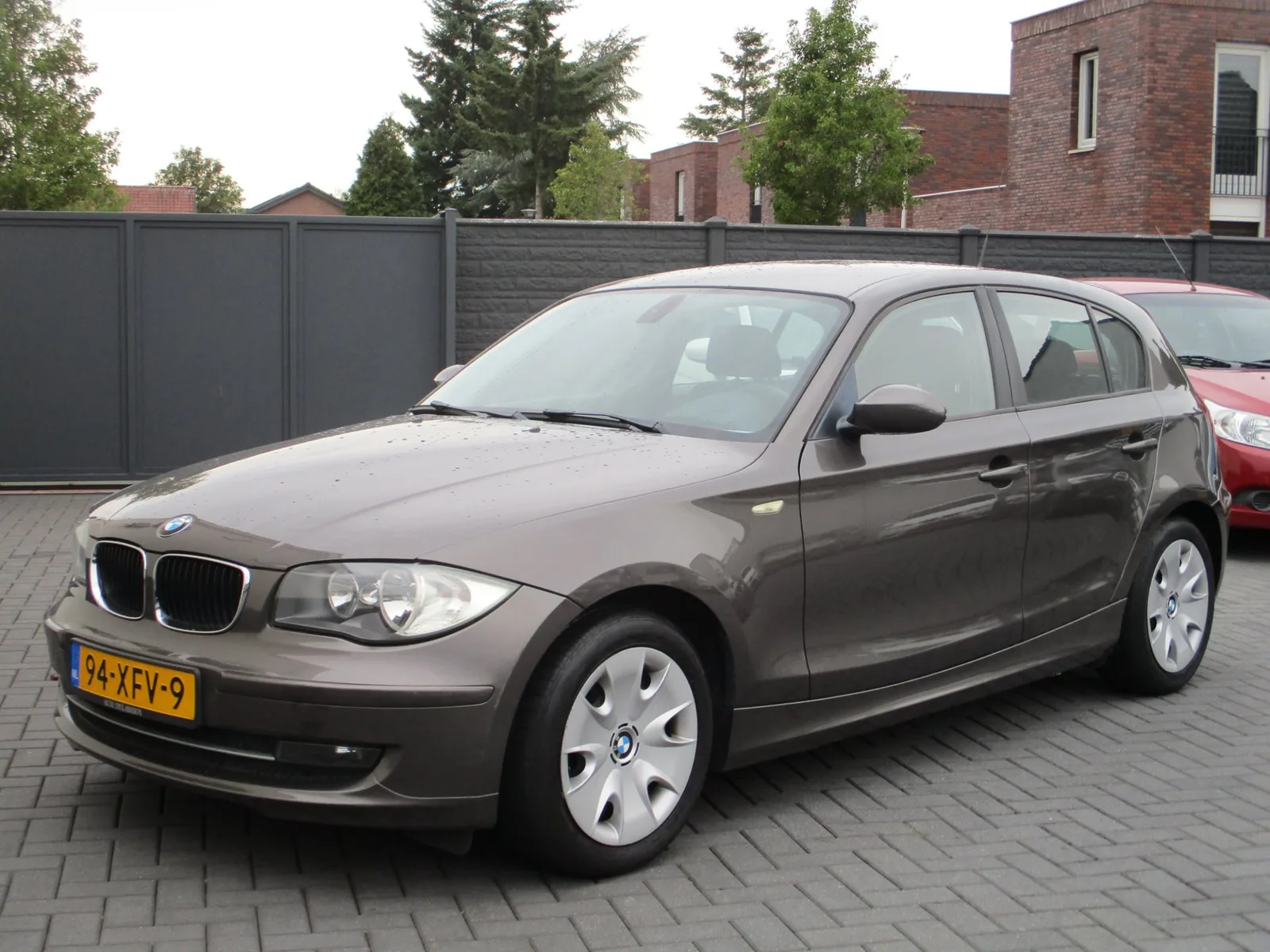 BMW 1-Serie (2009) — foto 1