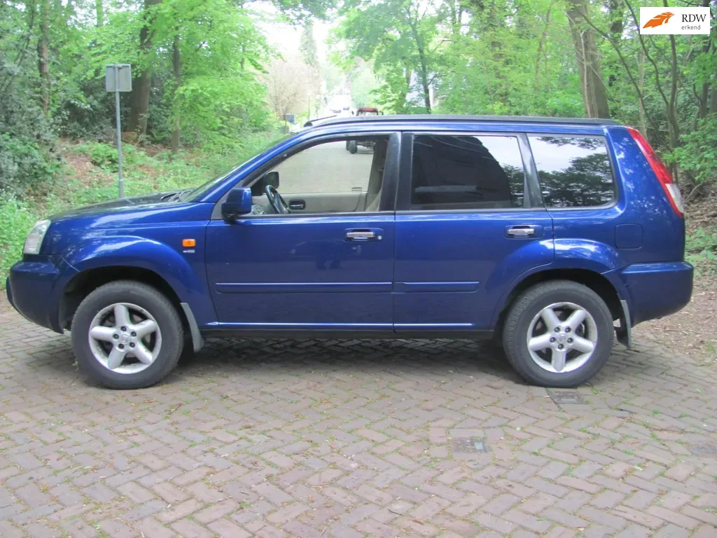 Nissan X-Trail (2003) — foto 1