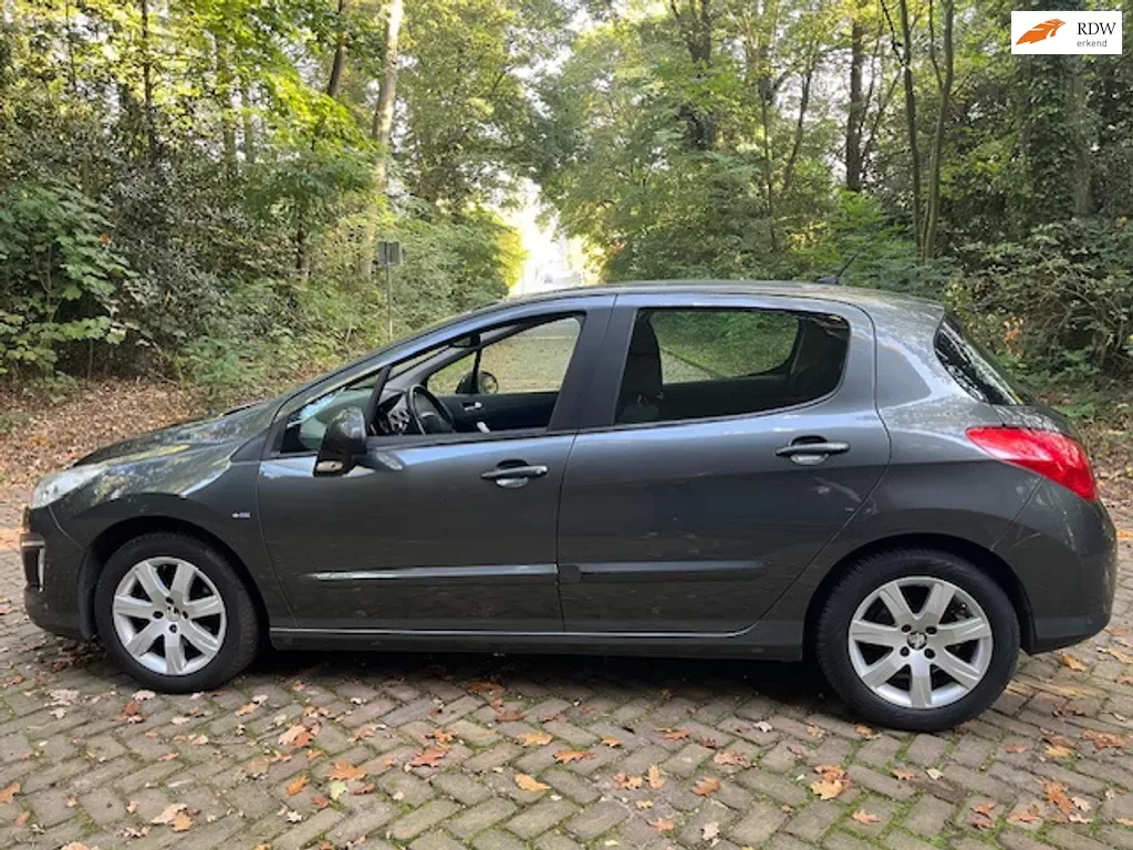 Peugeot 308 (2012) — foto 1