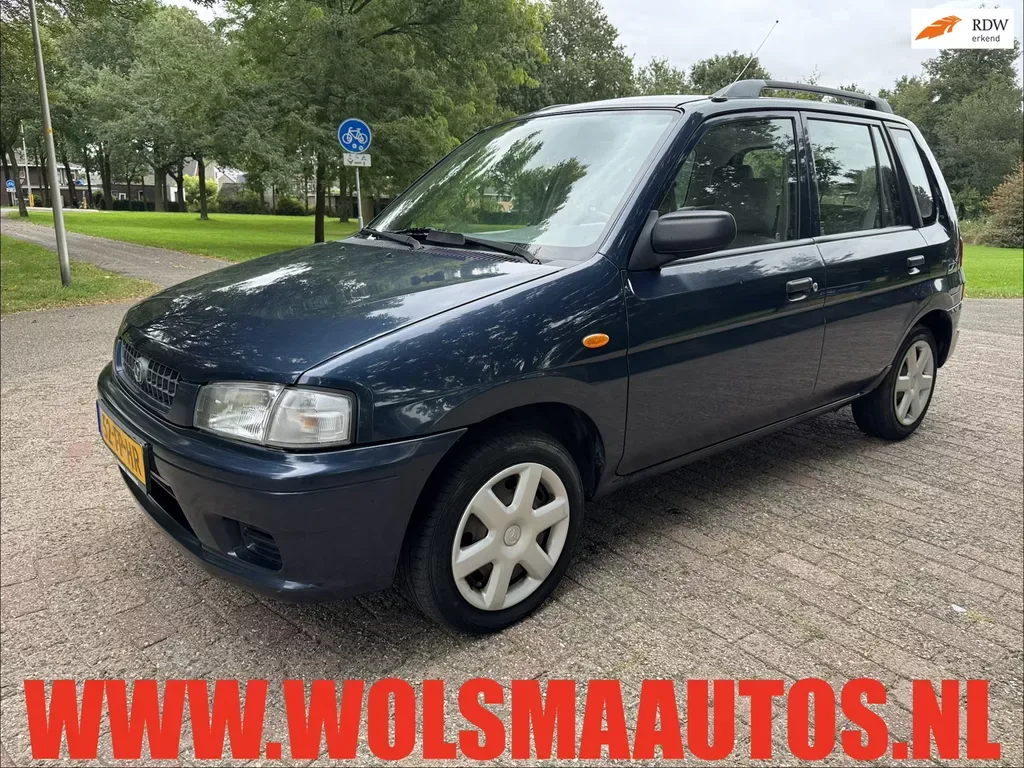 Mazda Demio (2000) — foto 1