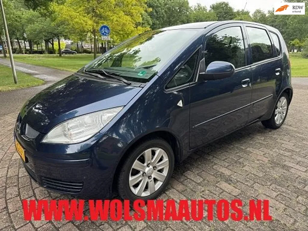 Mitsubishi Colt (2008) — foto 1