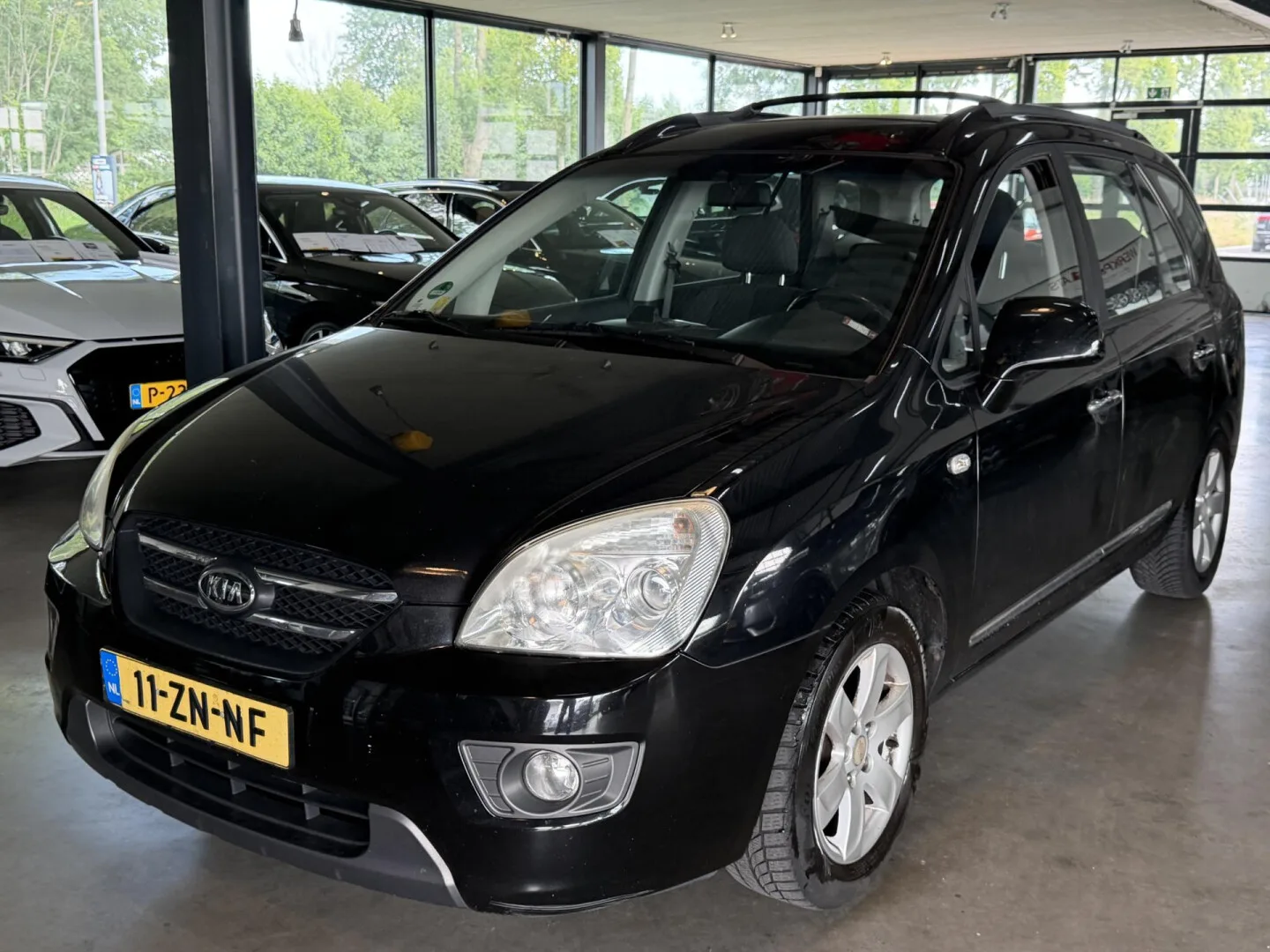 Kia Carens (2008) — foto 1