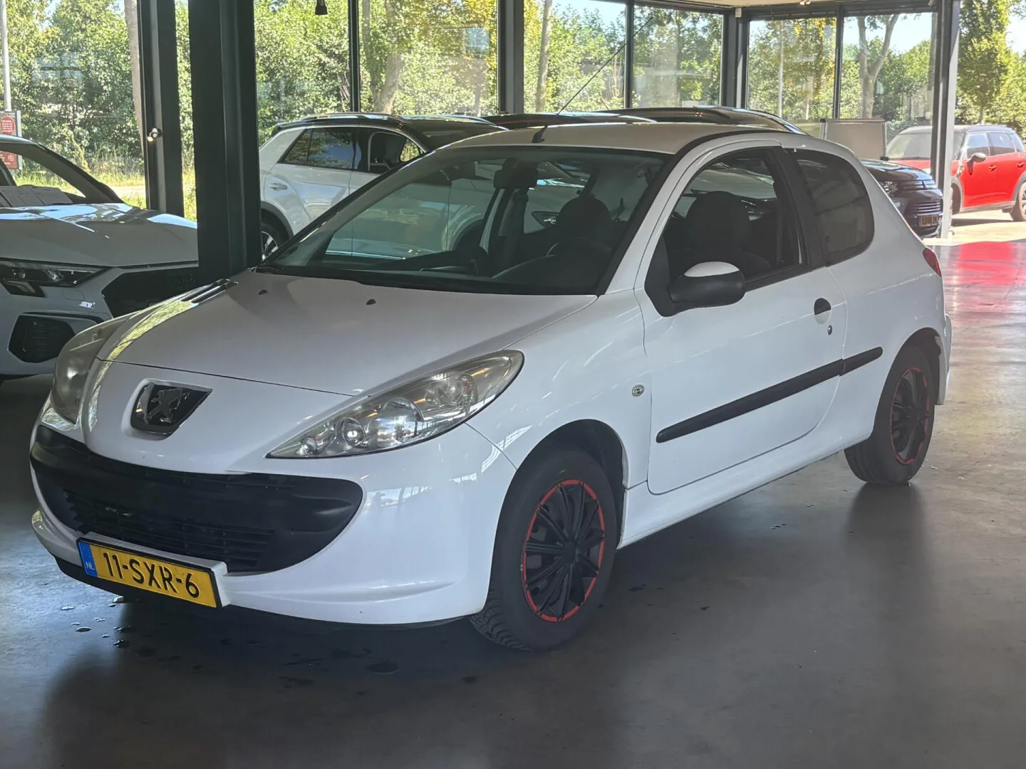 Peugeot 206 (2012) — foto 1