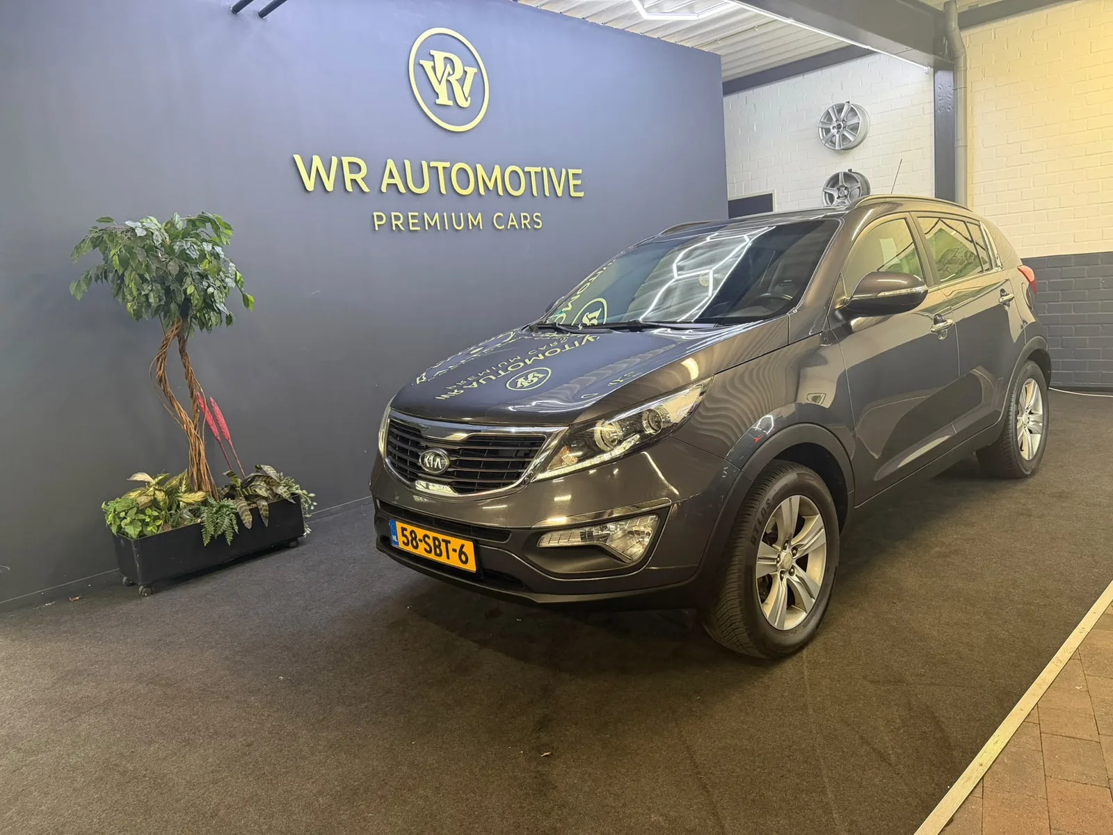 Kia Sportage (2011) — foto 1
