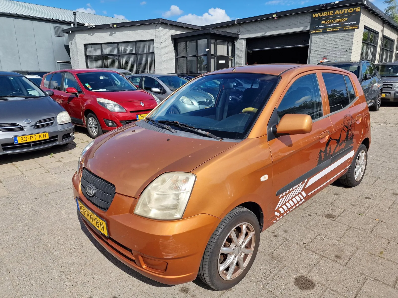 Kia Picanto (2004) — foto 1