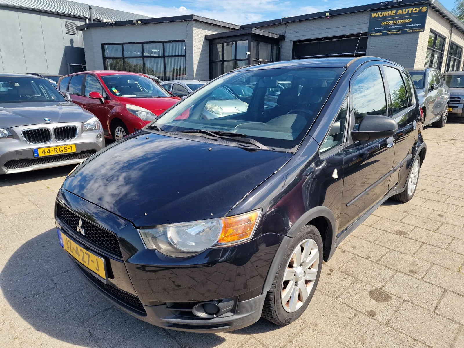 Mitsubishi Colt (2010) — foto 1