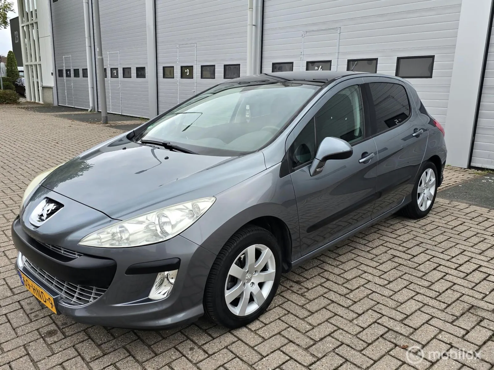 Peugeot 308 (2009) — foto 1