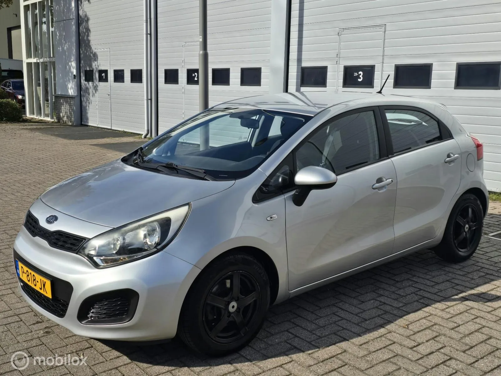 Kia Rio (2013) — foto 1