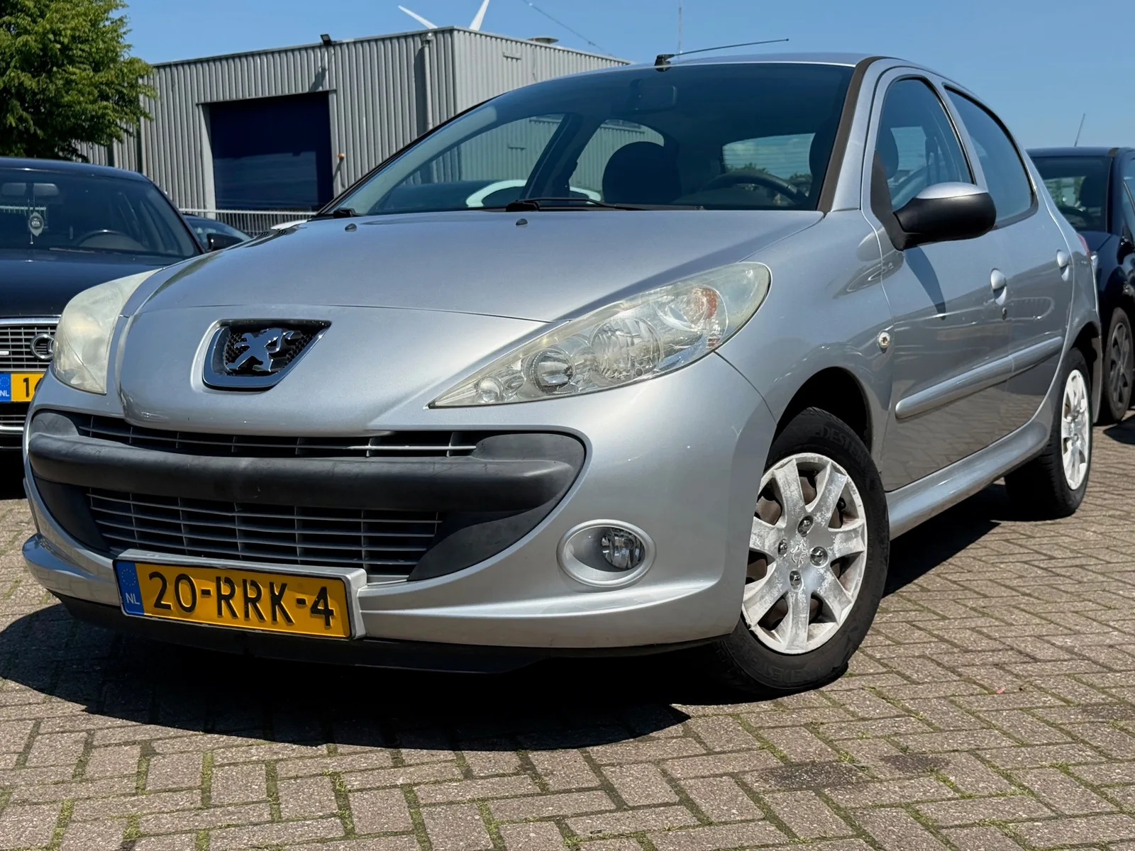 Peugeot 206 (2011) — foto 1