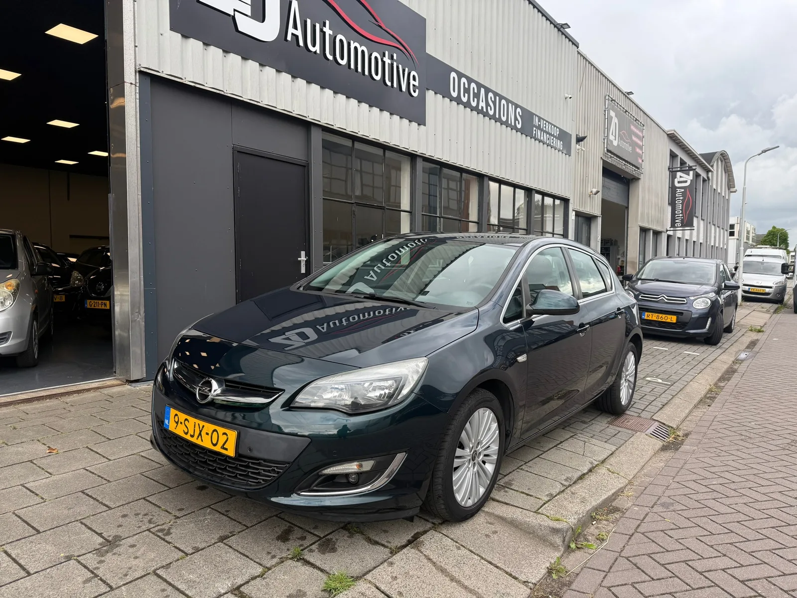 Opel Astra (2013) — foto 1